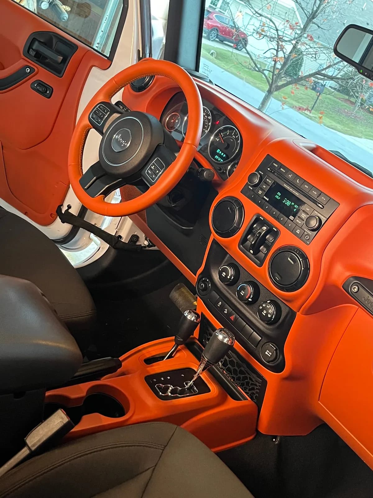 Jeep Wrangler dash, steering wheel and console recolored sunset orange