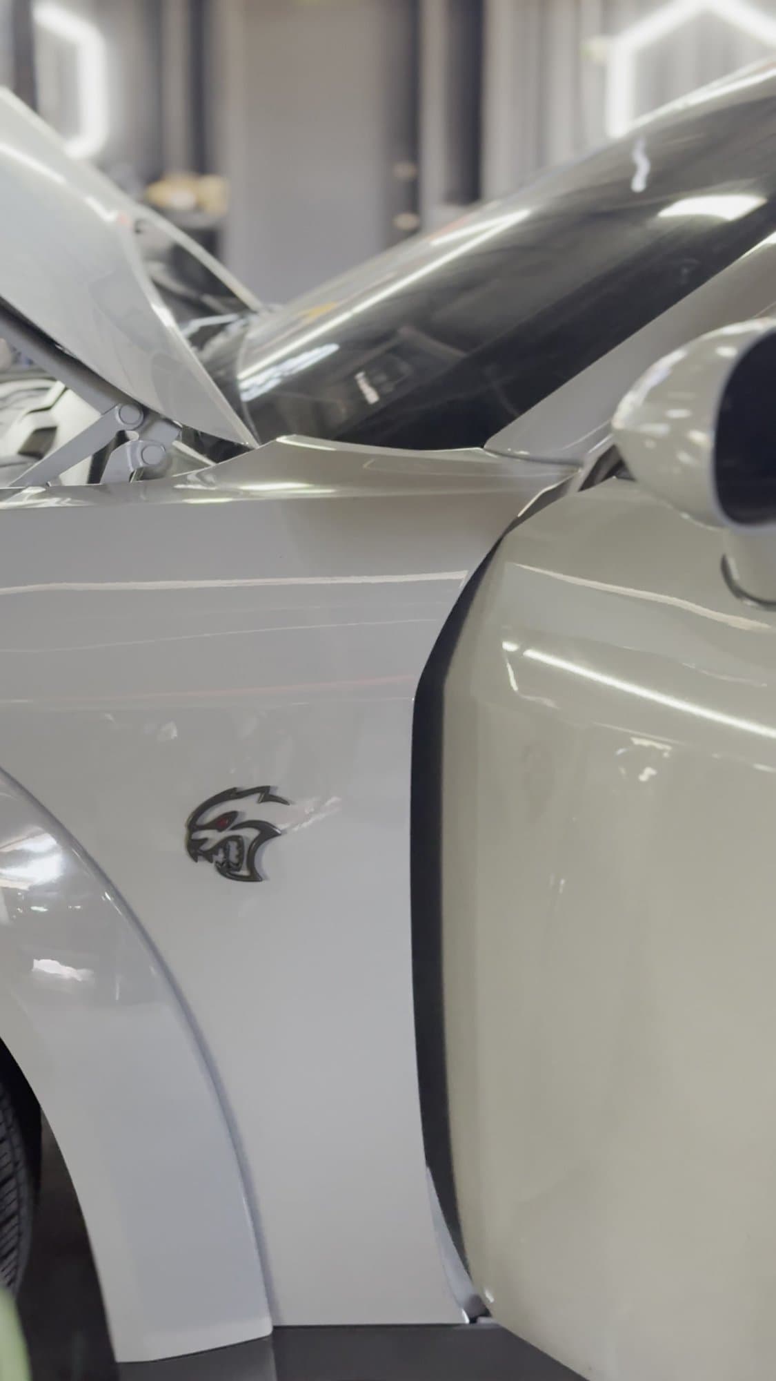 Hellcat fender badge on a Dodge Challenger at Corsa Automotive