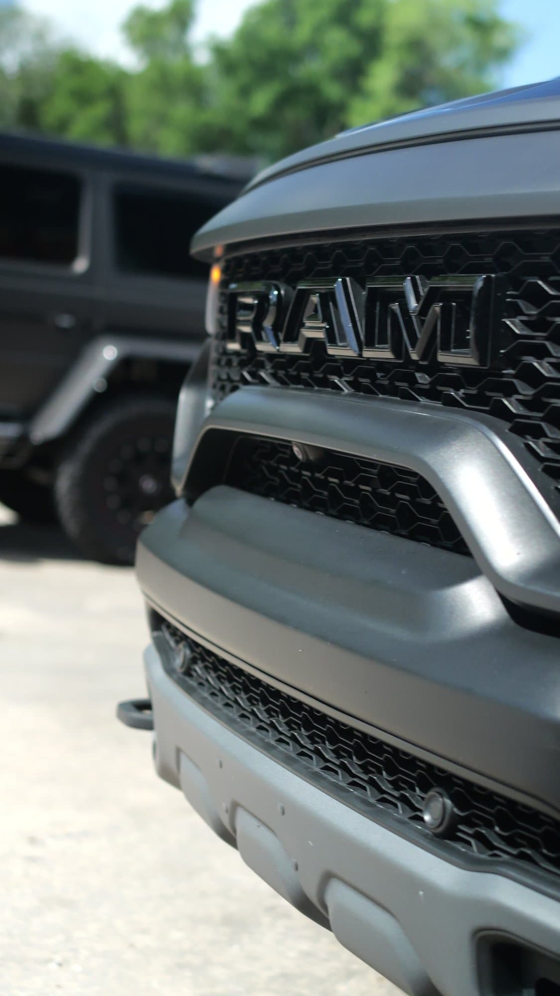 Ram 1500 TRX grille close-up at Corsa Automotive in Orlando